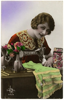 French woman using a sewing machine