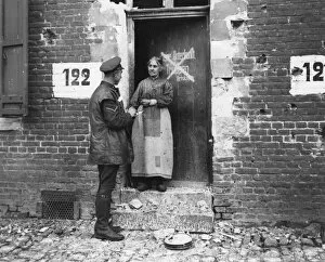 French Woman Collection: Frenchwoman at her door, Bouchain, France, WW1