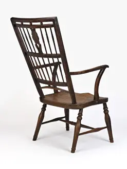 Fruitwood armchair with high back described as a Mendlesham