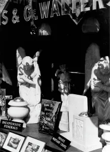 Funerals Prints: Funerary monuments in display window