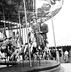 Fairground Prints: Gallopers ride at a fair, probably 1940s
