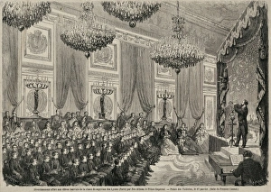 Gathered audience in grand room being entertained Gathered audience in grand room being entertained