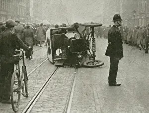 The General Strike - an overturned motor-van