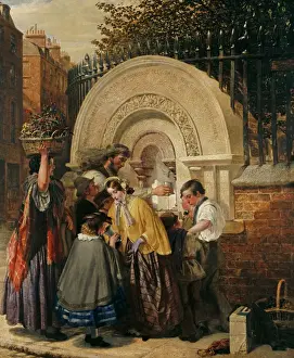 Genre scene of a group of people gathered around the first p