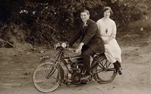 Gentleman & lady on their 1918 Levis motorcycle