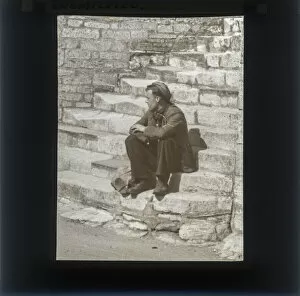 Images Dated 20th May 2019: Gentleman sitting on steps