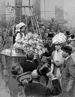 George V and Queen Mary in a crowd of people