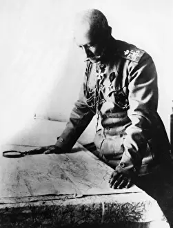 Magnifying Prints: German army officer examining a map, WW1