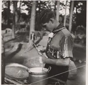 Stirring Prints: German boy scout cooking at camp
