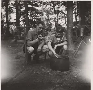 Stirring Prints: Two German boy scouts cooking at camp