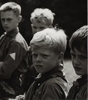 Four German boy scouts on an outdoor activity