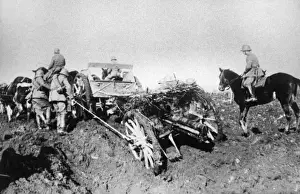 German gunners moving 77mm field guns, WW1