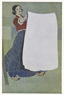 Hang Prints: German poster design, woman hanging out washing
