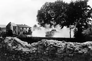 German tank outside village on Western Front, WW1