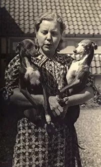 Flowery Collection: German woman and two dogs