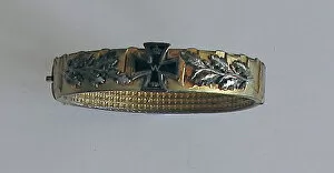 Images Dated 25th March 2011: Gilded copper drive band fashioned as a patriotic bracelet
