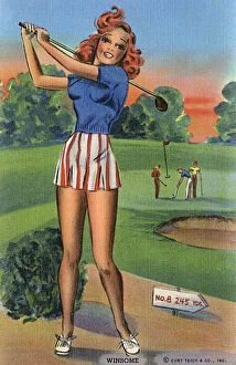 Allure Gallery: A ginger-haired young lady golfer, completing her swing