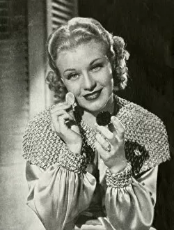 Applying Gallery: Ginger Rogers, applying Max Factor make up