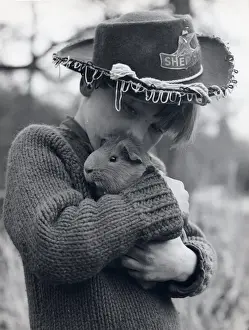 Sheriff Prints: Gipsy boy with his pet guinea pig