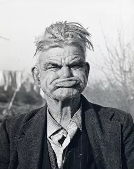 Untidy Collection: Gipsy man pulling a gurning face, Lewes, Sussex