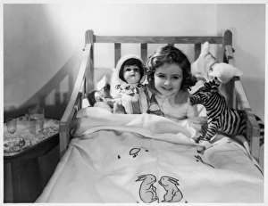 Girl in Cot