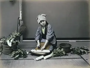 Girl cutting a Japanese radish