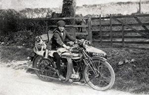 Triumph Gallery: Girl & dog on a 1921 Triumph SD motorcycle & sidecar