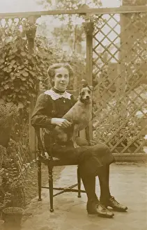 Trellis Prints: Girl with a dog in a garden