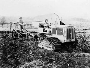 Girl Driving a Tractor