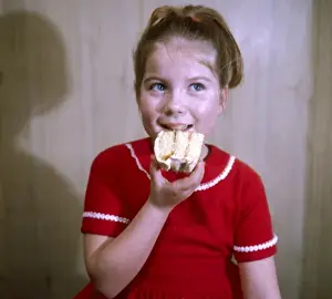 Iced Prints: Girl Eats a Cake 1960S