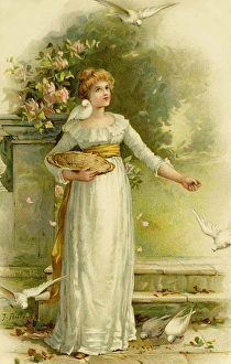 Ellen Collection: Girl feeding white doves