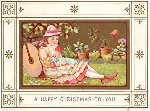 Girl in a garden with a doll on a Christmas card