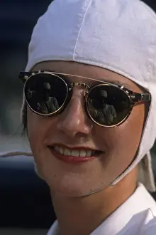 Buttonhole Prints: Girl with goggles and white helmet. Vertical format