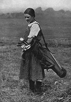 Caddy Prints: Girl golf caddy, WW1