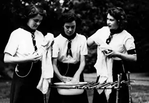 Patrol Prints: Girl Guides: Princess Elizabeth washing up, 1944