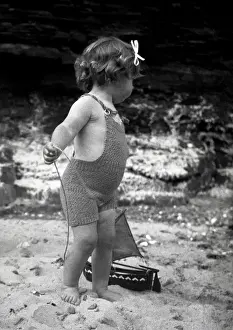 Stitch Prints: Girl in knitted swimsuit with model boat
