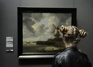 Girl looking at The Windmill at Wijk bij Duurstede 1670, by