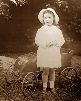 Girl with pedal car