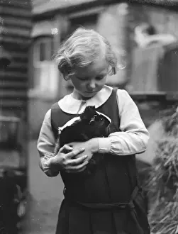 Girl and Pet Guinea Pig - 1