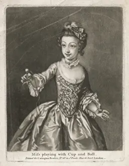 Girl Plays Cup and Ball