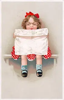 Chequered Prints: Girl reading a newspaper on a greetings postcard