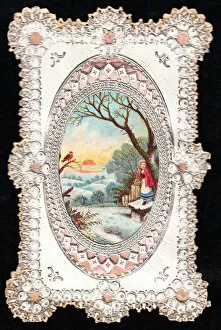 Girl, robin and snow scene on a Christmas card