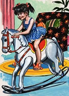 Images Dated 26th October 2006: Girl on Rocking Horse