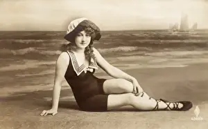 Girl in studio pose in swimwear