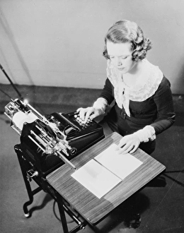 Adding Gallery: Girl using adding machine