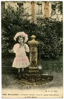 Girl at water fountain, Montmartre, Paris, France