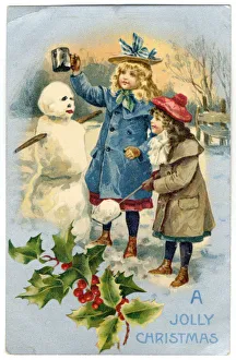 Cold Gallery: Two girls crowning their snowman