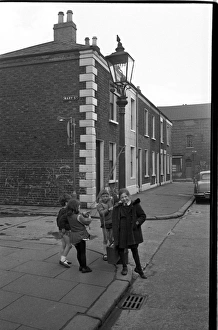 Images Dated 11th September 2015: Girls playing in Mary Street, Belfast, Northern Ireland