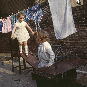 Children Wash Clothes