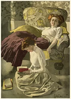 Images Dated 7th April 2021: Two girls reading books, one sprawled in an armchair, the other kneels on the floor